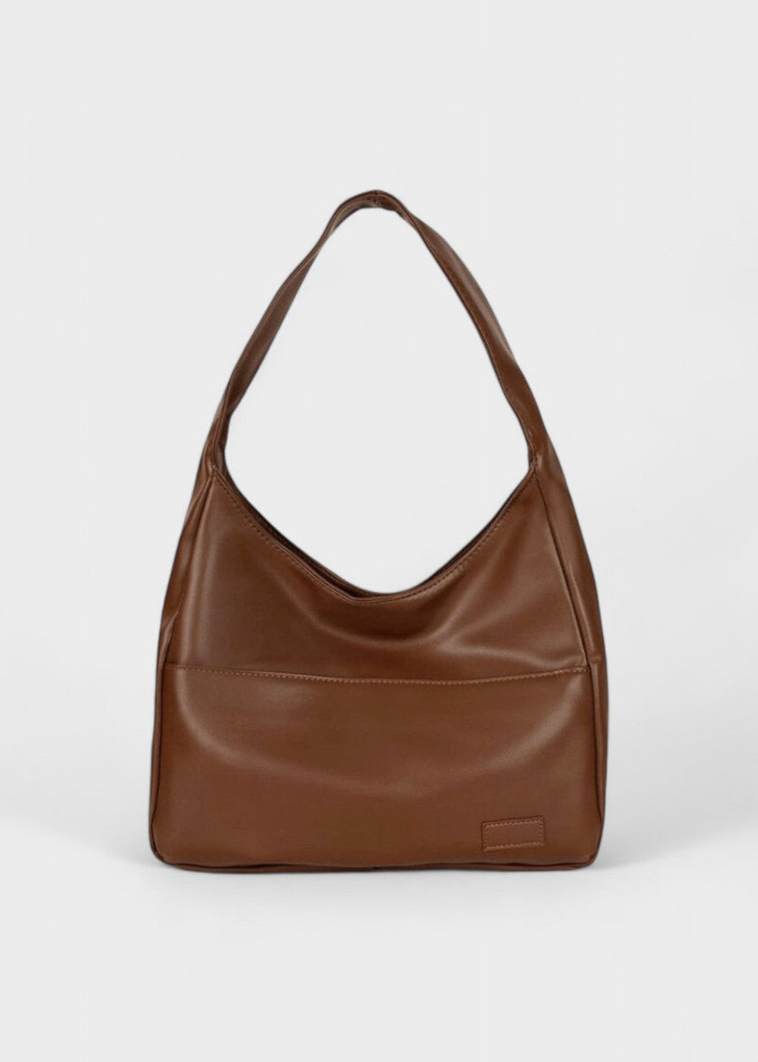 StyleMate™ — One bag that completes every look and every moment